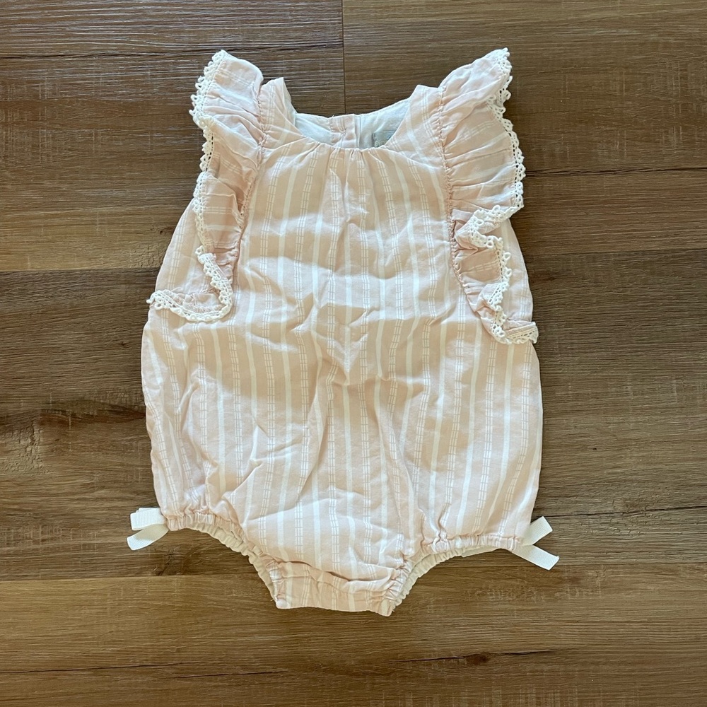 Only worn once! Soft pink bubble romper w/ grosgrain bows and ruffle details